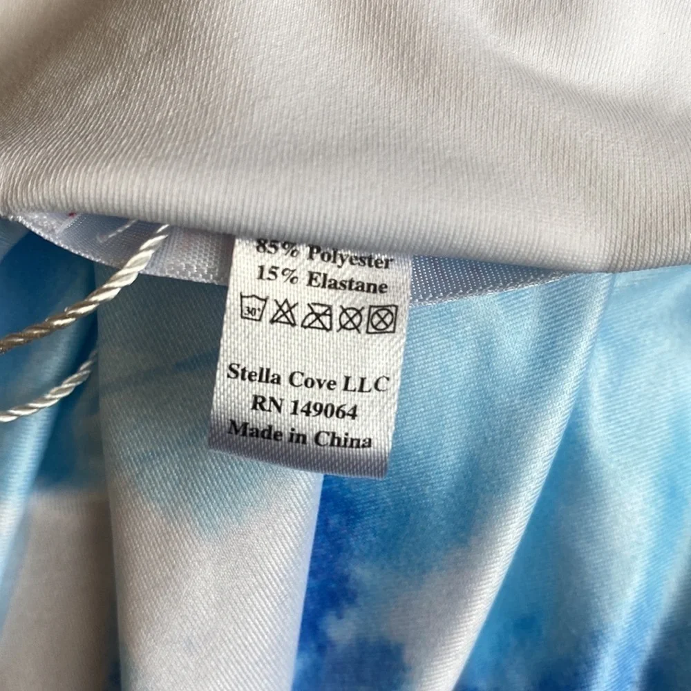 Stella Cove blue draped tie dye ruffle shoulder swimsuit NWOT